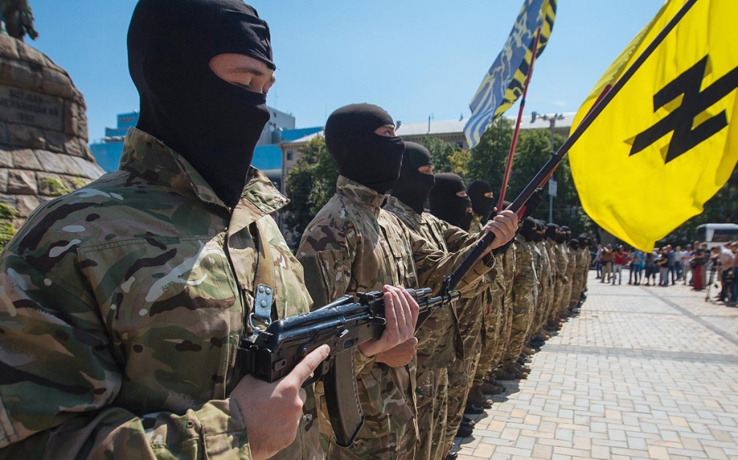 The racist group fighting alongside Ukrainian forces & why you didn’t know about them